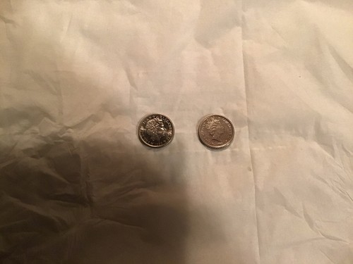 Manx golf themed coins in - themed,